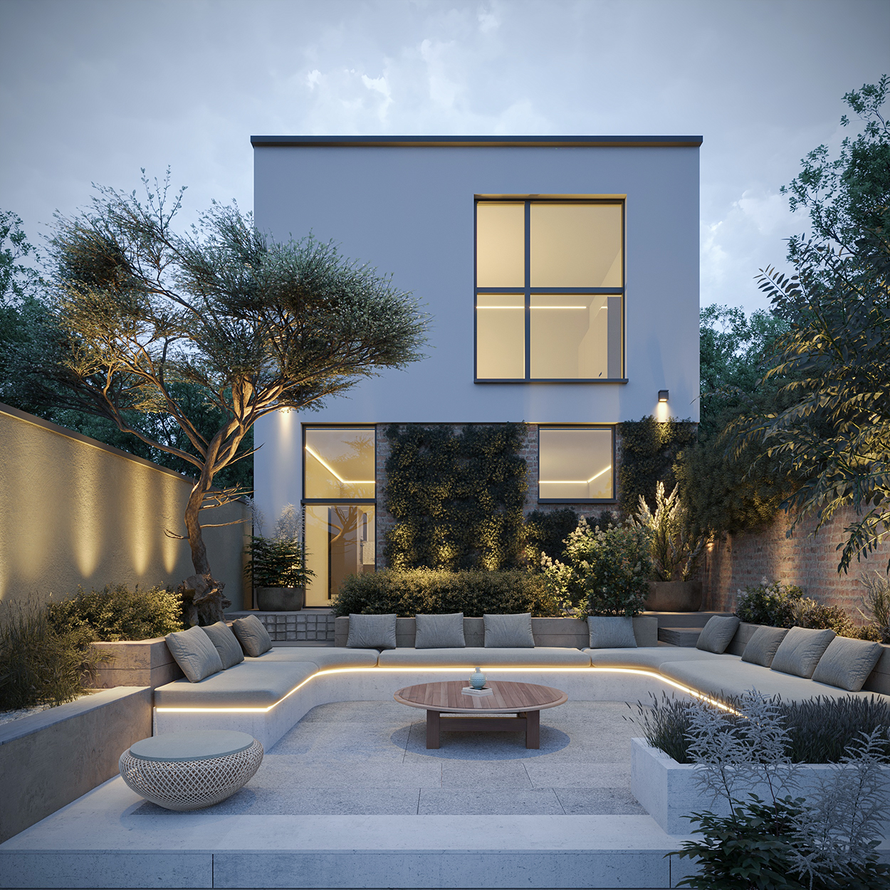 House exterior with a garden, central bench with cushions, and evening lighting.