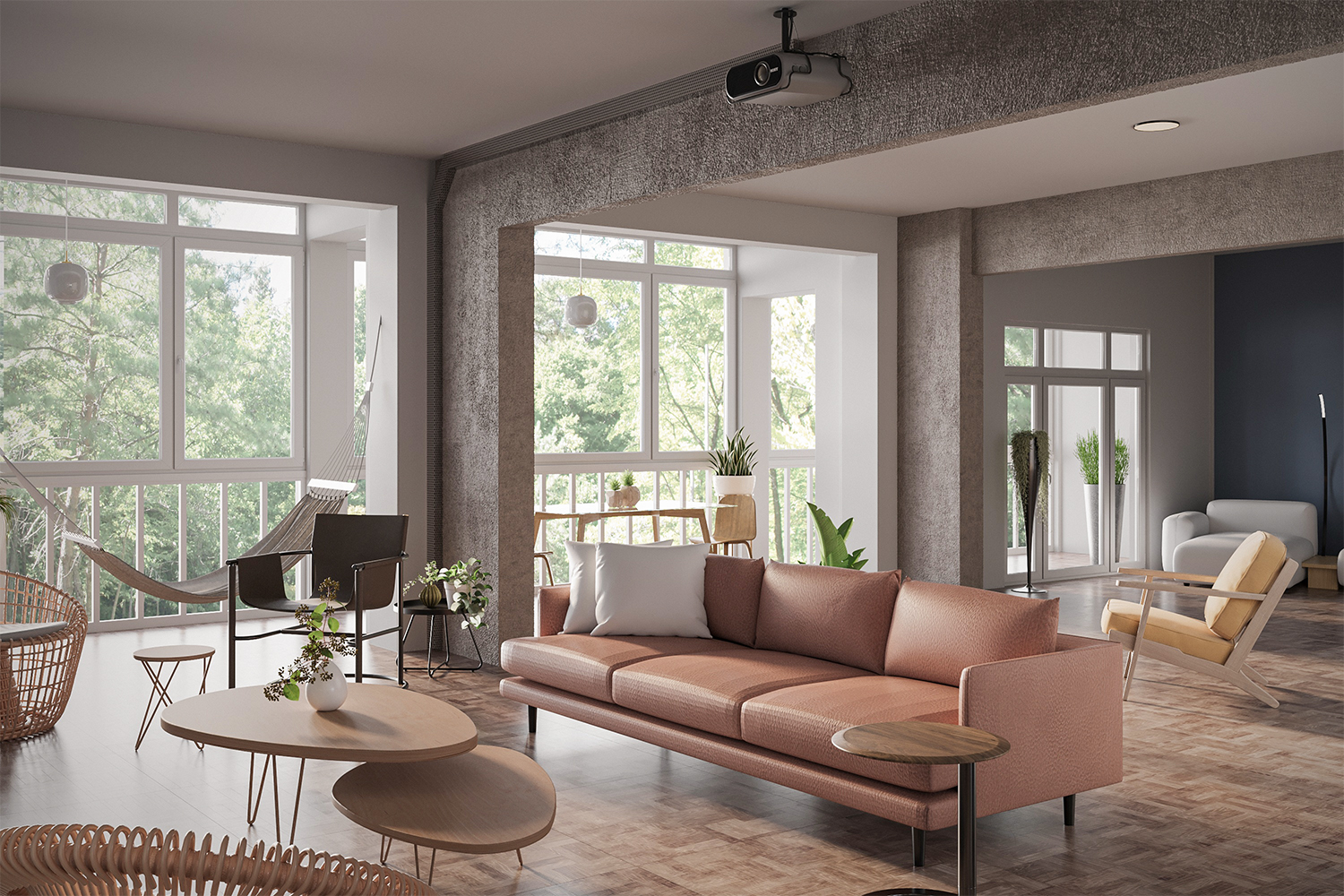 Large living room with brown sofa, wooden floor, and natural light.